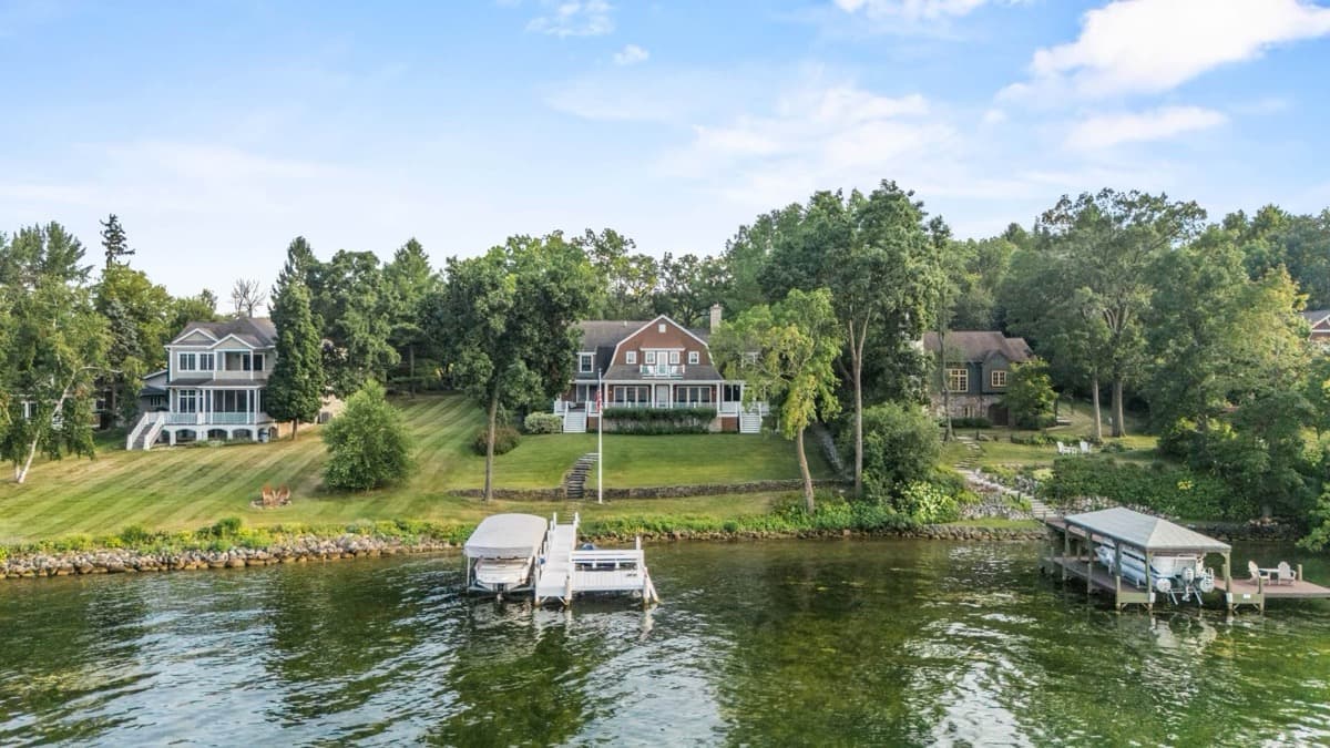 Lakefront homes and piers photographed from the air
